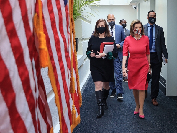 Nancy Pelosi walking down the hall